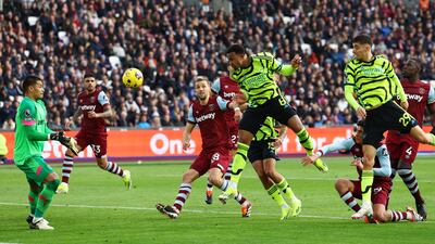 Arsenal's defender Gabriel heads home their third goal. Reuters