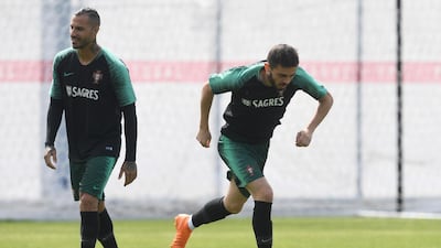 Portugal's midfielder Bernado Silva, right, and forward Ricardo Quaresma attend a training session at their base camp in Kratovo, Moscow, Russia, on June 12, 2018. Francisco Leong / AFP