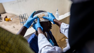 A man injured in a drone attack near Um Baru, Sudan, is treated at a hospital in Chad. AFP