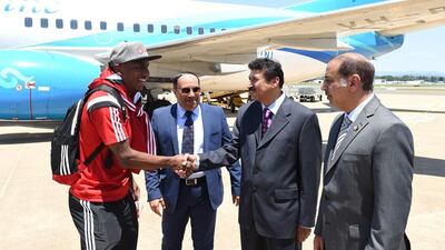 A UAE football player greets dignitaries in Canberra as the team arrived there on Wednesday for the 2015 Asian Cup.