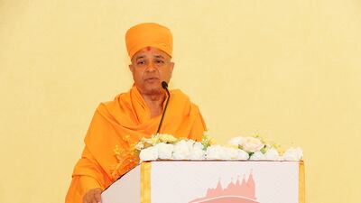 Swami Brahmaviharidas, head of international relations for Baps, speaking during a press conference in Abu Dhabi. Pawan Singh / The National
