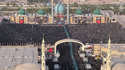 Crowds gather in Qom for the funeral procession of late supreme leader Ayatollah Ali Khamenei on Tuesday. EPA
