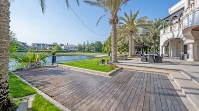 The spacious garden has both decked and lawned areas. Courtesy The Urban Nest