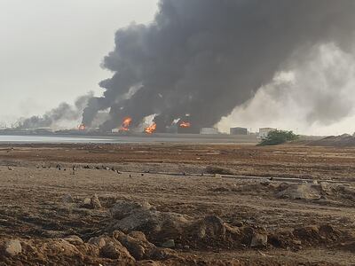 Fries burn at Hodeidah port on Monday, two days after Israeli air strikes