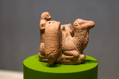 This camel figurine from Syria, dating from 1-324 CE, is on loan from the Louvre in Paris. Victor Besa / The National