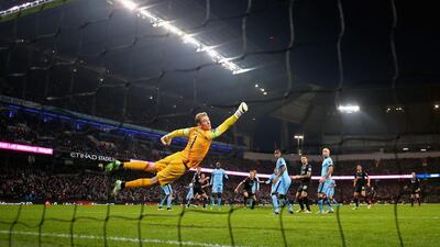 Ashley Barnes of Burnley beats Joe Hart of Manchester City to score the equalising goal at Etihad Stadium. Alex Livesey / Getty Images