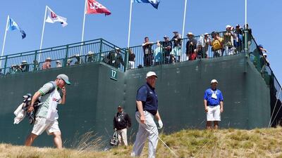 Colin Montgomerie walks off the 18th tee. Ross Kinnaird / Getty Images / June 20, 2015