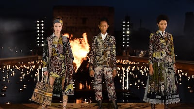 Models walk the runway during the Christian Dior Cruise 2020 show. Getty Images