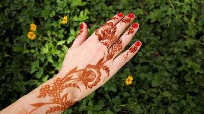 Henna was used as an art form in Asia, then a hair dye in Ancient Egypt and now is a part of Eid celebrations. Christopher Pike / The National