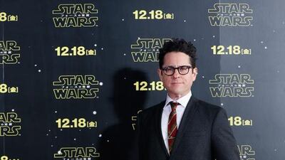 Director J J Abrams poses with the droid BB-8. Christopher Jue / Getty Images