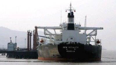 An oil tanker is anchored offshore on April 15, 2006 near Zhoushan, China. China's surging appetite for energy is rattling Washington and aggravating an already intense rivalry with neighboring Japan over access to oil and gas supplies, adding to tensions in an already volatile region. (AP Photo/Eugene Hoshiko)