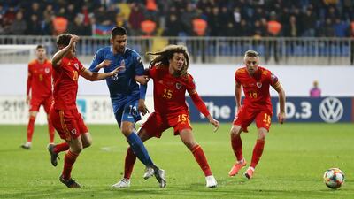 Wales's Ethan Ampadu and Daniel James in action against Azerbaijan's Dimitrij Nazarov. Reuters