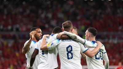 Marcus Rashford celebrates with his England teammates after scoring the third goal in the 3-0 Group B win against Wales at Ahmad Bin Ali Stadium in Doha on November 29, 2022. Getty