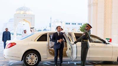 Sheikh Mohamed and Mr Macron arrive for the reception. UAE Presidential Court