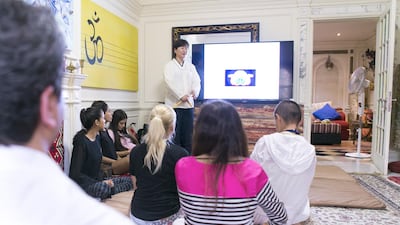 Inside Taijitu House of Om Master Daae Kim leads a Brain Sensitizing: Brain Energy Awareness Training session. Reem Mohammed / The National
