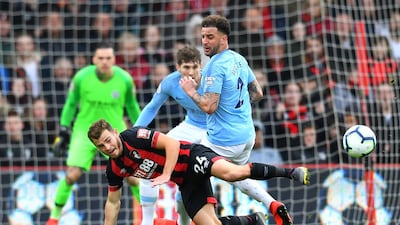 Bournemouth's Ryan Fraser in action with Walker. Reuters