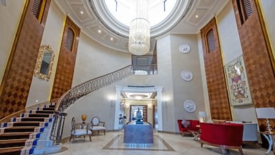 The sweeping staircase in a grand entrance hallway certainly makes a statement. Courtesy The Urban Nest