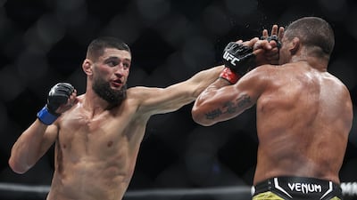 Khamzat Chimaev punches Gilbert Burns during their welterweight fight at UFC 273 in Florida last year. AFP