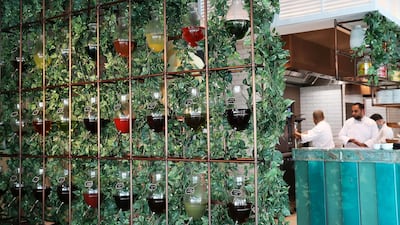 The restaurant has an olive oil and vinegar tasting wall.