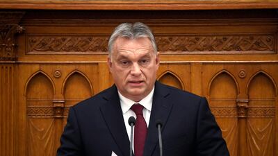 Viktor Orban delivers his address to the Hungarian Parliament. MTI via AP