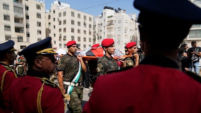 A Palestinian honour guard carries the body of Aysenur Eygi in Nablus. AP