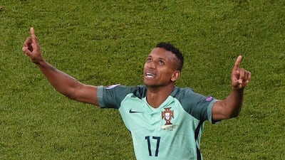 Portugal forward Nani celebrates after scoring a goal during the Euro 2016 semi-final football match between Portugal and Wales at the Parc Olympique Lyonnais stadium in Décines-Charpieu, near Lyon, on July 6, 2016. Jean-Philippe Ksiazek / AFP