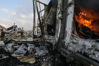 Palestinians search for bodies and survivors among the rubble of a destroyed building following an overnight Israeli air strike on the Al-Zawayda neighborhood in the central Gaza Strip. EPA