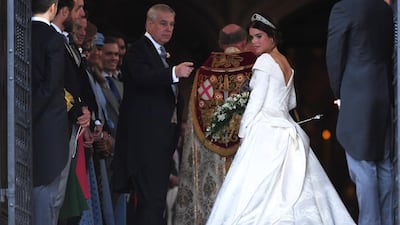 Britain's Princess Eugenie of York arrives with her father, Prince Andrew, Duke of York for her wedding ceremony. EPA