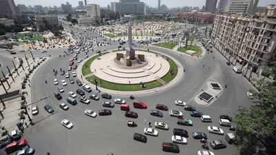 A roundabout near Tahrir Square in Cairo, Egypt. The increased police presence in the area did not appear to be needed, with streets devoid of traffic and the usually heaving pavements empty. EPA