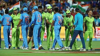 Players from both teams shake hands after the 2015 ICC Cricket World Cup match between India and Pakistan at Adelaide Oval on February 15, 2015 in Adelaide, Australia. India won by 76 runs. (Photo by Morne de Klerk/Getty Images)