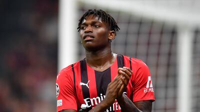 AC Milan's Rafael Leao applauds fans as he walks off the pitch to be replaced by Fode Ballo-Toure. Reuters