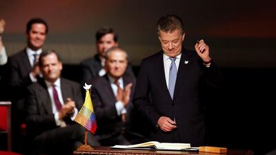 Colombian president Juan Manuel Santos prepares to sign a new peace accord in Bogota on November 24, 2016. Jaime Saldarriaga/Reuters