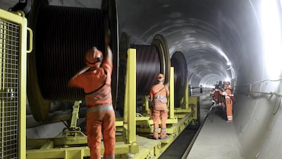 Workers between Biasca and Amsteg, Switzerland leg of the tunnel in 2013. Karl Mathis / Keystone via AP file)