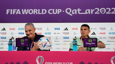 Brazil head coach Tite, left, and Thiago Silva attend a press conference on Wednesday, November 23, 2022. AP