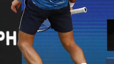 Novak Djokovic reacts after losing a point. EPA