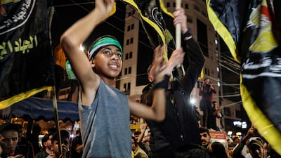 Gaza residents and supporters of the Palestinian Islamic Jihad militant group celebrate