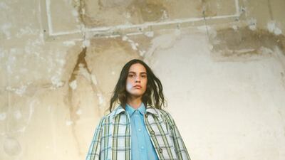 Masculine checks are given an upgrade with the new knee length skirt at Victoria Beckham