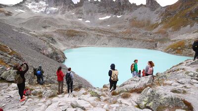 People look at the Pizol glacier as they take part in a mourning ceremony as awareness to climate change, Switzerland. Reuters