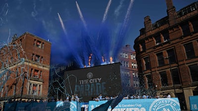 The Man City trophy parade kicks off in central Manchester. AFP