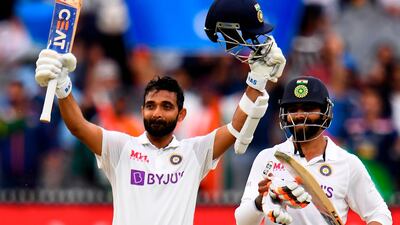 India's Ajinkya Rahane celebrates scoring his century against Australia in Melbourne. AFP