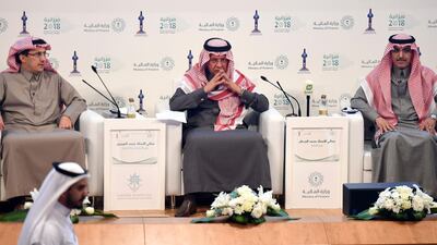 Saudi finance minister Mohammed al-Jadaan, right, minister of economy and planning, Mohammed al-Tuwaijri, centre, and Saudi Arabian Monetary Agency (SAMA) governor Ahmed al- Khulaifi take part in a press conference during which officials announced the state budget for 2018. AFP/Fayez Nureldine