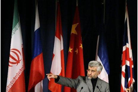 Saeed Jalili, Iran's chief nuclear negotiator, answers questions yesterday in Geneva.