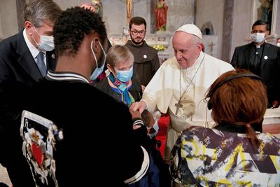 Pope Francis met migrants at the Roman Catholic Church of the Holy Cross in Nicosia and urged unity as Europe faces an influx of refugees and migrants. AFP