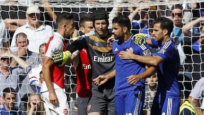Diego Costa has been handed a three game ban but Gabriel Paulista's red card has been rescinded. Ian Kington / AFP