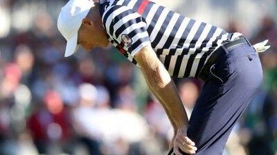 Jim Furyk of the USA reacts to a missed par putt on the 18th green during the Singles Matches.