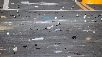 Tear gas canisters litter the road. AFP