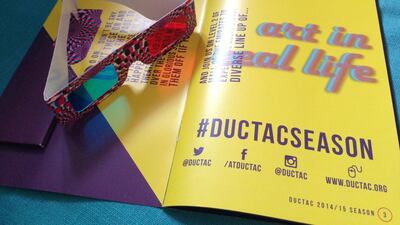 The new Dubai Community Theatre & Art Centre (Ductac) 2014-2015 catalogue is out now with complimentary 3D glasses and very cool artwork inside. (Photo by Anna Seaman)