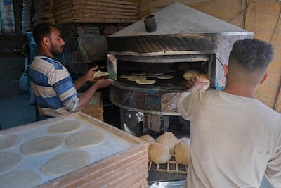 A bakery worker in Cairo. AFP