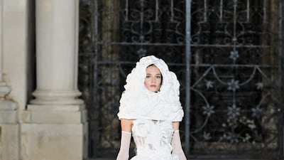 Bridal-esque gowns were covered in three-dimensional blooms.