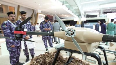 Visitors from the Military check out the CEST MR40 UAV System. Victor Besa / The National